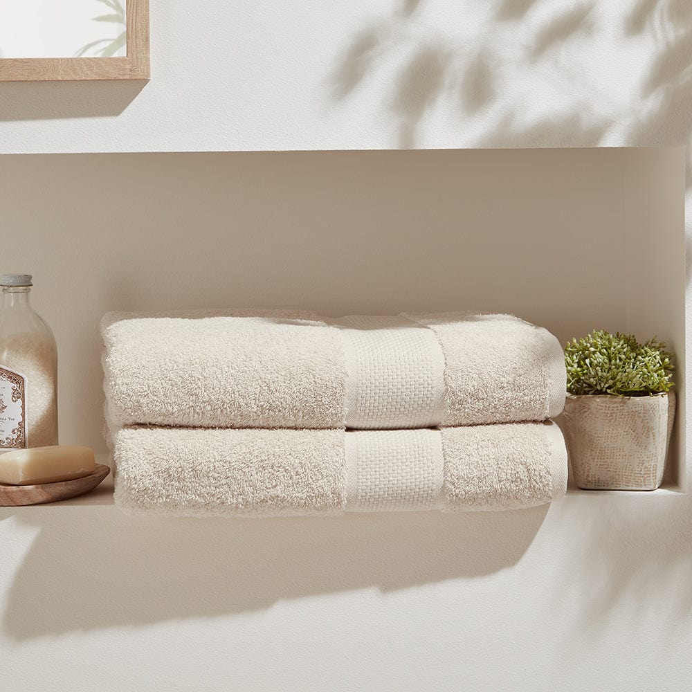 Coordinated collection of organic cotton bath towels for a luxurious bathroom experience