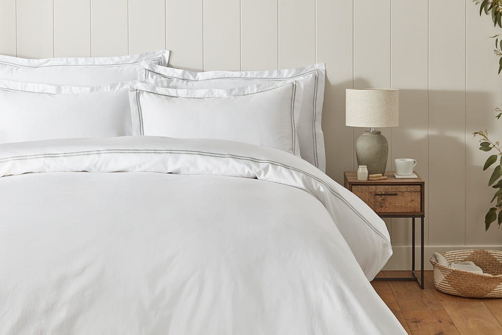 Close-up of the 300 thread count sateen weave fabric showcasing its softness and quality."
