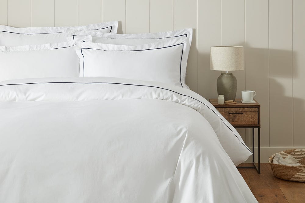 Close-up of the 300 thread count sateen weave fabric showcasing its softness and quality."