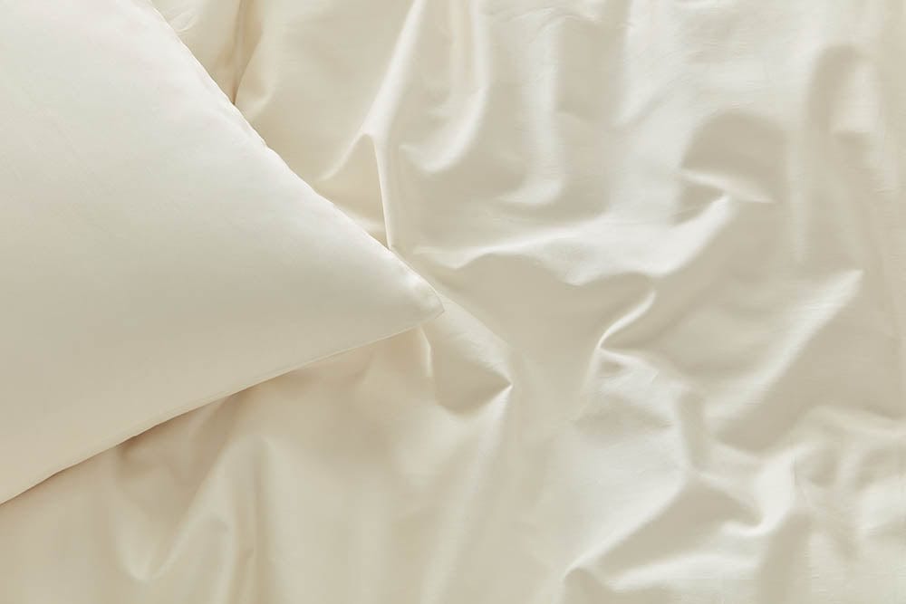 Luxurious and natural organic cotton sheet set, ensuring a peaceful and eco-friendly sleep experience.