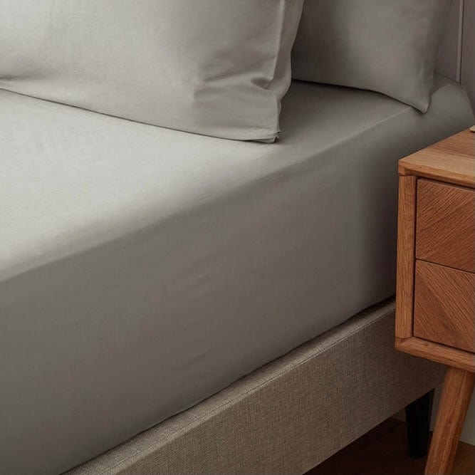 Versatile fitted sheets from the Aura Collection, combining charm and versatility in your bedroom decor.