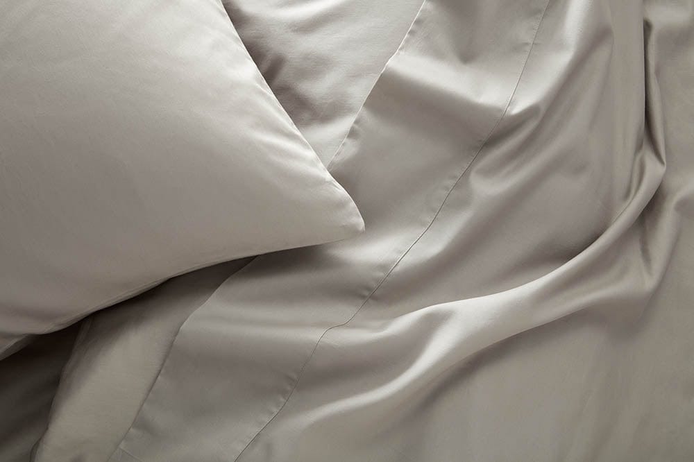Premium organic cotton luxury in the Aura Collection Bed Set, offering unparalleled comfort.