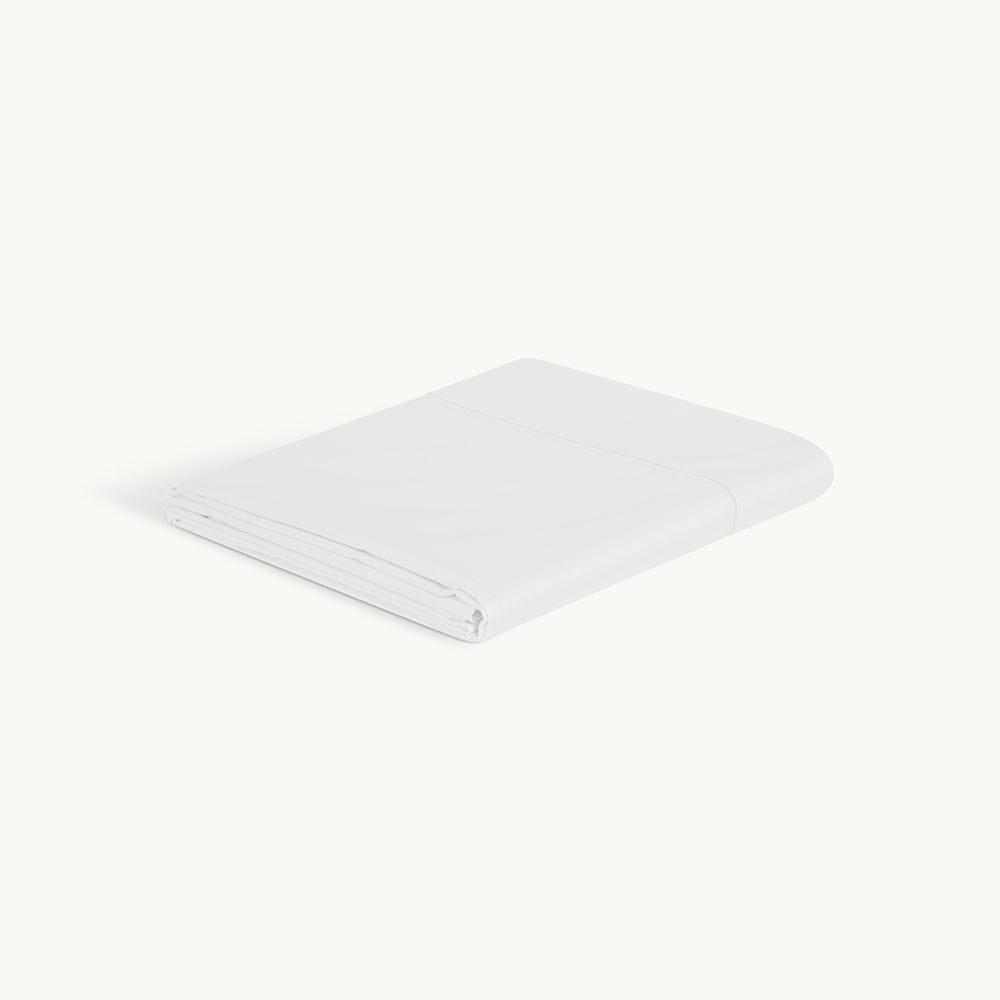 Indulge in the softness and durability of our organic cotton flat sheet