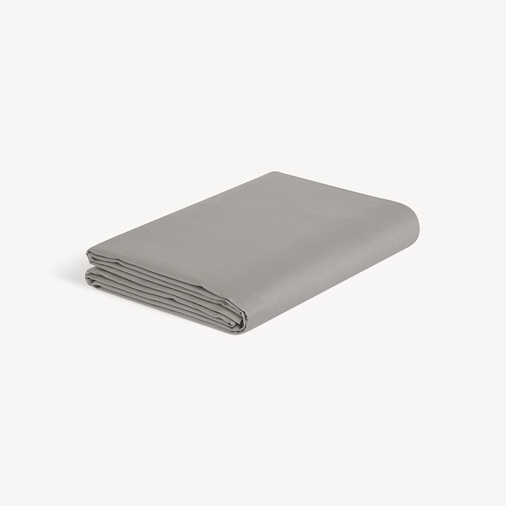 Eco-friendly luxury fitted sheets, crafted from organic cotton for a sustainable sleep experience.