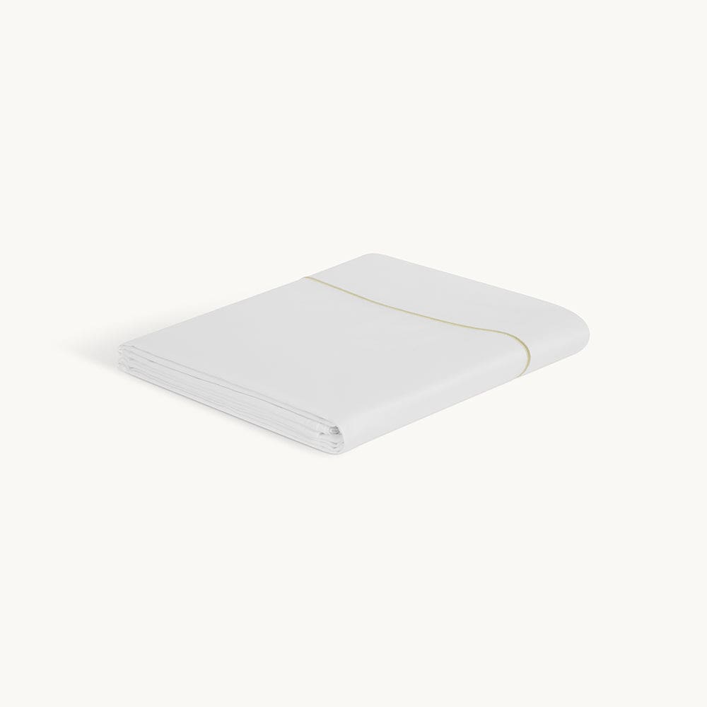 Luxuriously soft organic cotton flat sheet in white with color trim