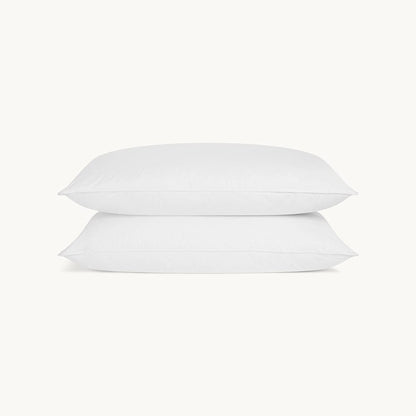 Perfect duo of down surround pillows in a two-pillow set, ensuring restful nights of sleep.